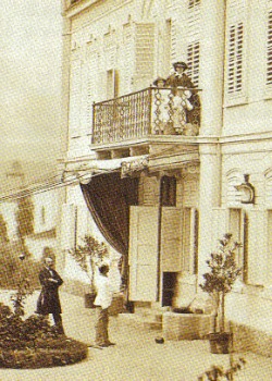 Empress Sisi with Gisela and Rudolf on the balcony of the Kaiservilla