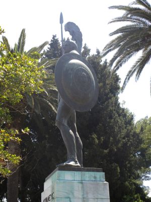 A towering statue of Achilles, sculpted in a triumphant pose, dominates the gardens of the Achilleion Palace. Made of iron and bronze, this statue reflects the preference of Kaiser Wilhelm II, who replaced an earlier sculpture depicting the wounded Achilles.